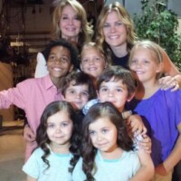 Deidre Hall (Marlena), Alison Sweeney (Sami), Terrell Ransom Jr. (Theo), Carolyn and Campbell Rose (Allie), Griffin and Aaron Kunitz (Johnny), and Berlyn and Brooklyn Baca (Sydney) on the set of Days of Our Lives in 2014.